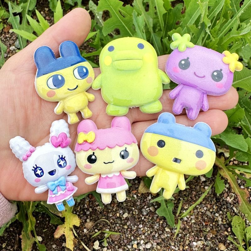 45mm Cartoon Tamagotchi double - Jewelry Making Accessories recension och pris