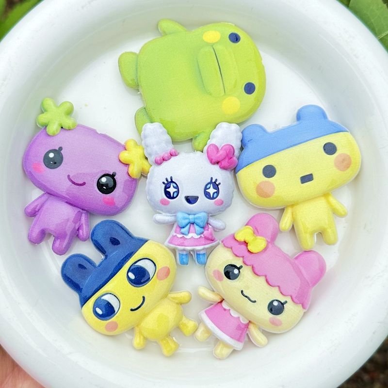 45mm Cartoon Tamagotchi double - Jewelry Making Accessories recension och pris