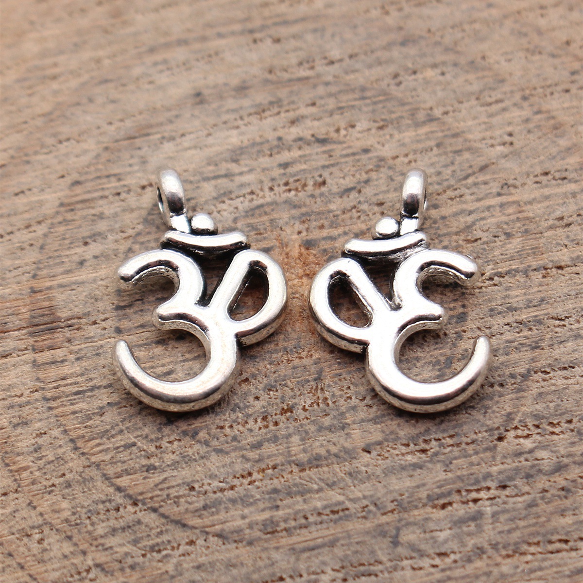 Om Yoga Meditation Symbol Char - Jewelry Making The Well recension och pris